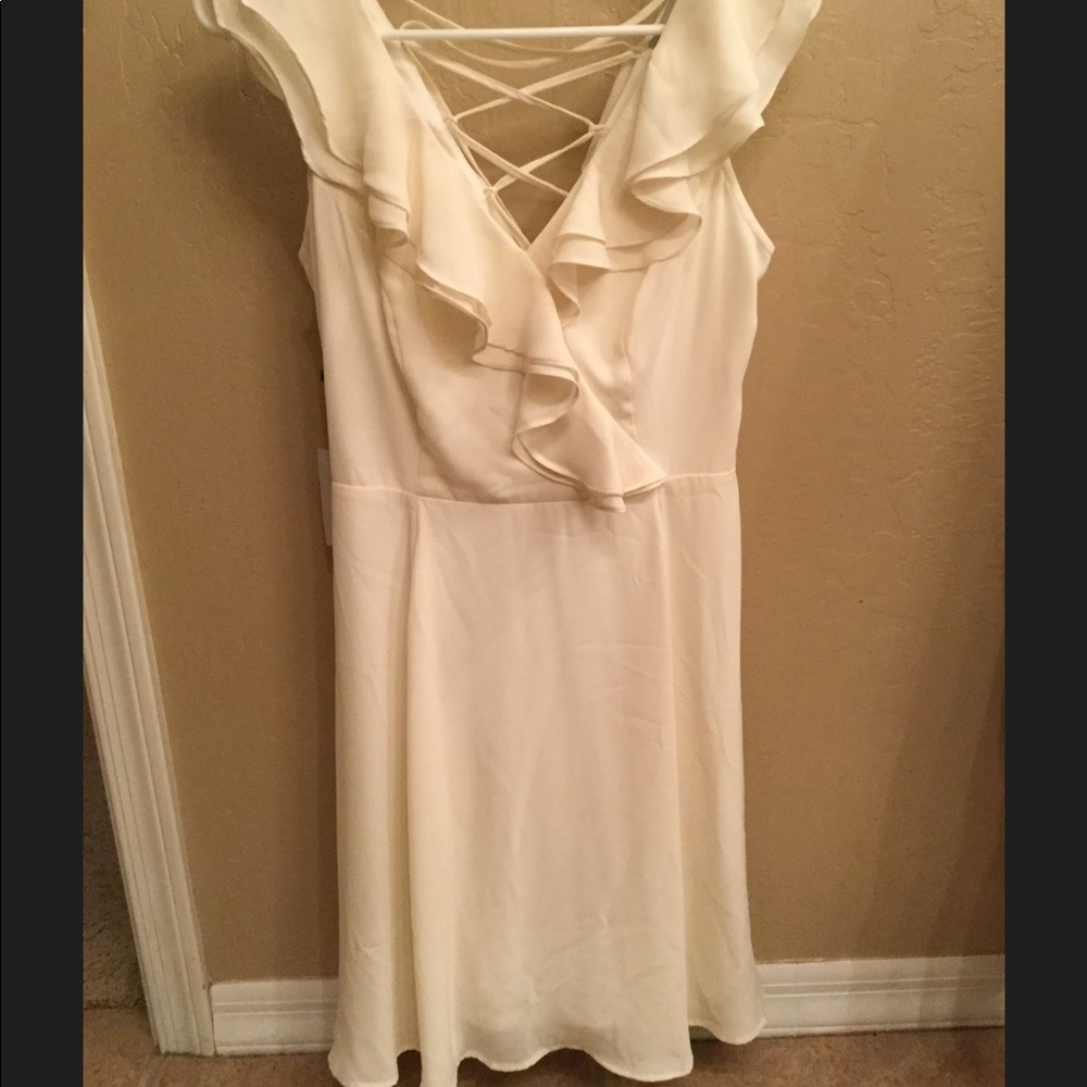 BRAND NEW Cream dress criss cross in back